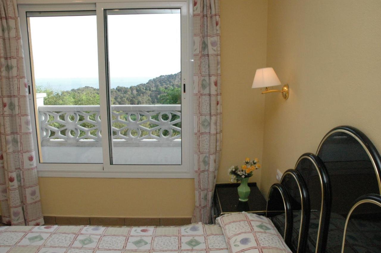 Apartamentos Famara Lloret de Mar Pokoj fotografie